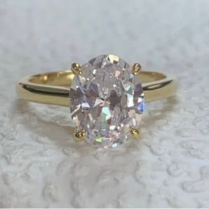4.5 ct White Sapphire Oval Solitaire in Gold     Size 8.75